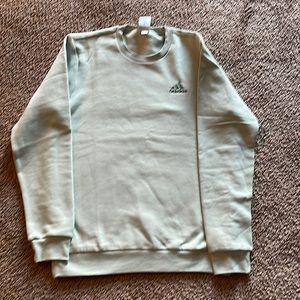 Light green adidas sweater size medium new condition